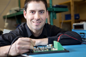 Man working on a circuit board