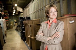 woman standing in a warehouse